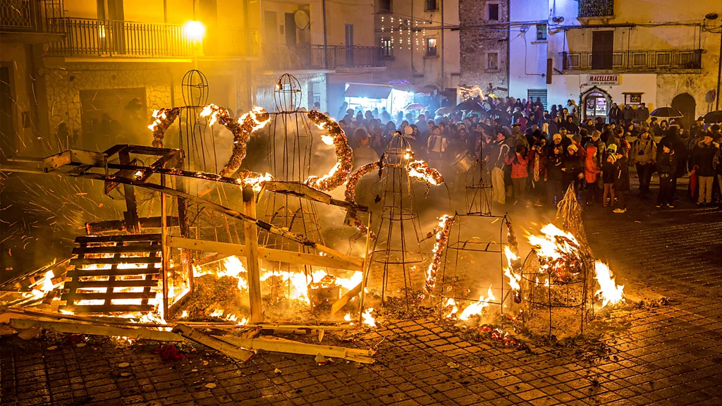 A woman serves a bowl of Favata at a panarda dinner in Villavallelonga, Abruzzo (Credit: Alamy)