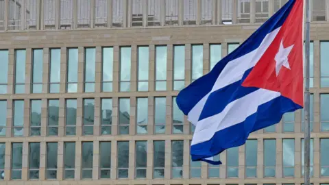 A Cuban flag flies near the US embassy in Havana in 2025.