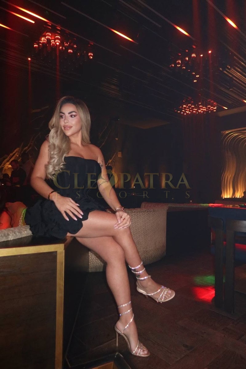 Elegant escort woman at Cleopatra Escorts London club.