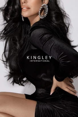 Stunning woman with jet black flowing locks