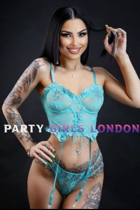 Hot girl with black hair and sexy tattoos