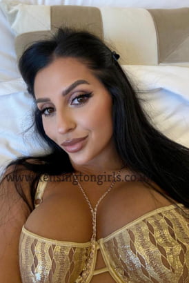 Hot dark haired Turkish girl in a close up selfie